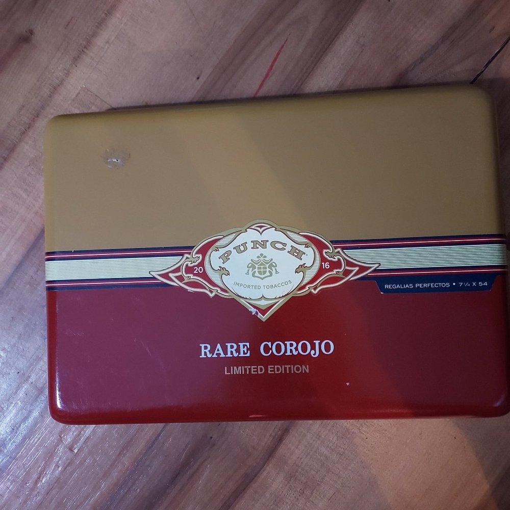 ARare metal Punch Imported Tobacco's Cigar box